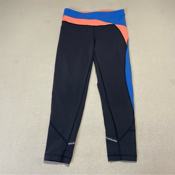LULULEMON IVIVVA Girls Hyper Track Crops Pop Orange Coal Pool Blue Size 8 - Picture 2 of 9